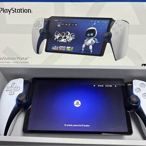 Sony White Portable Gaming Console with Detachable Controllers